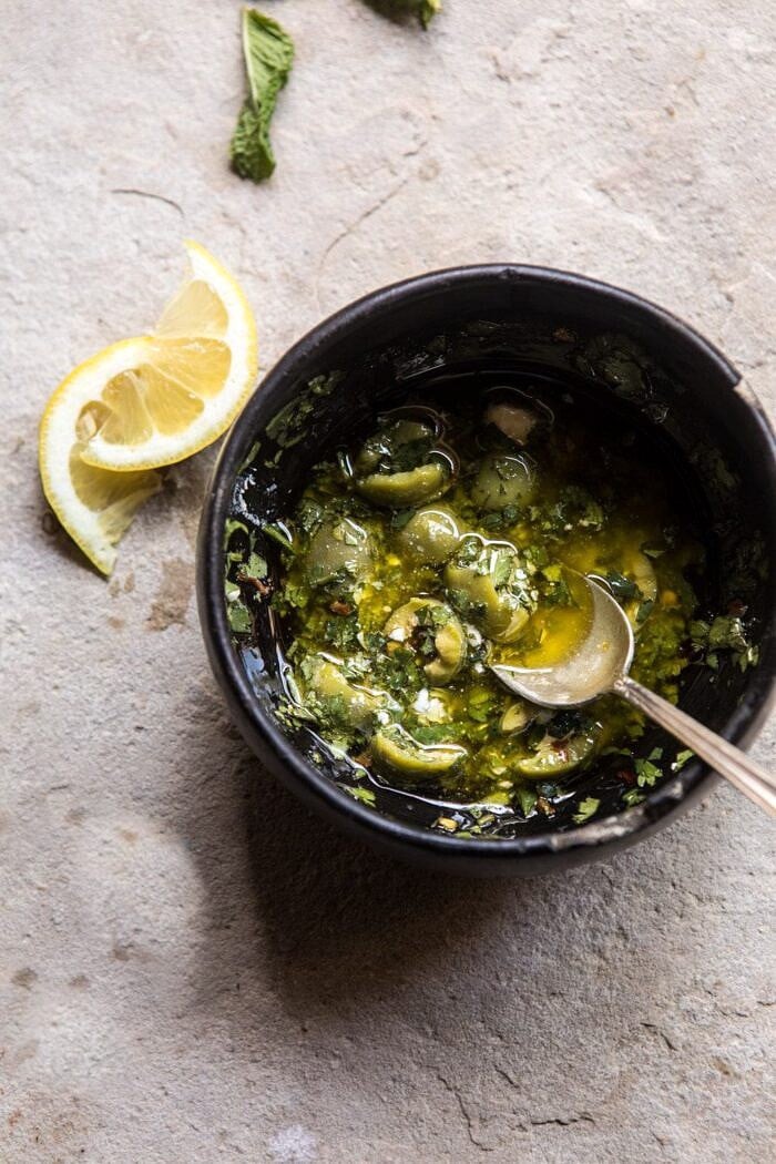 overhead photo of Herby Lemon Olive Vinaigrette