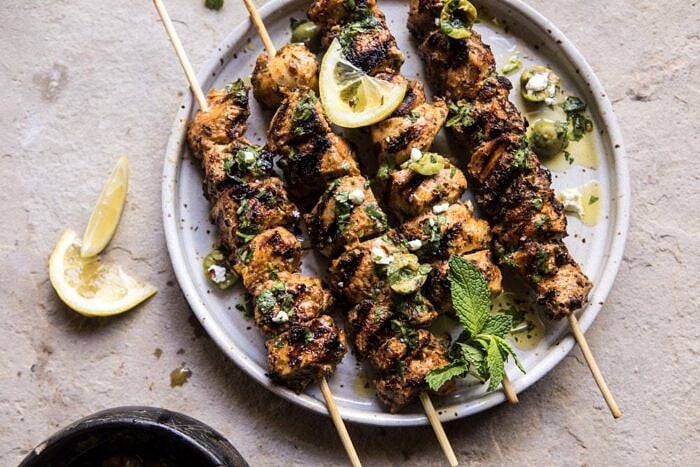 overhead horizontal photo of Moroccan Grilled Chicken with Herby Lemon Olive Vinaigrette 