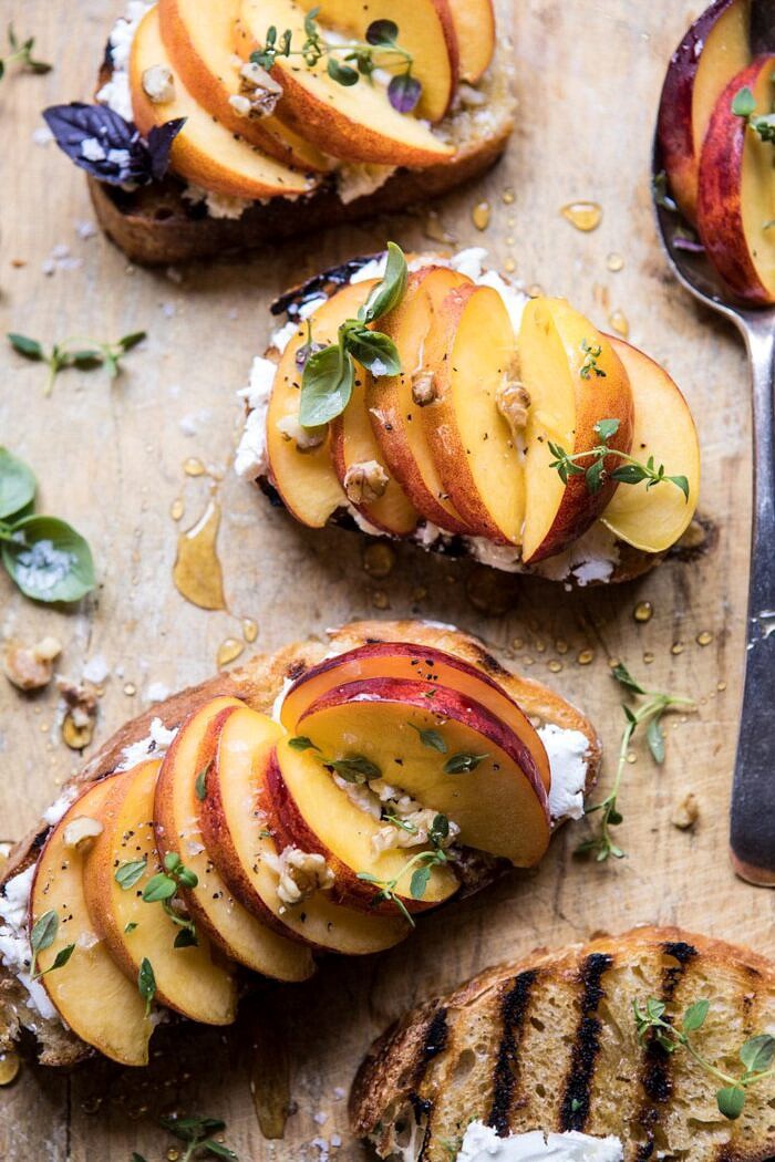 overhead close up photo of Thyme, Honey, Peach, and Goat Cheese Crostini