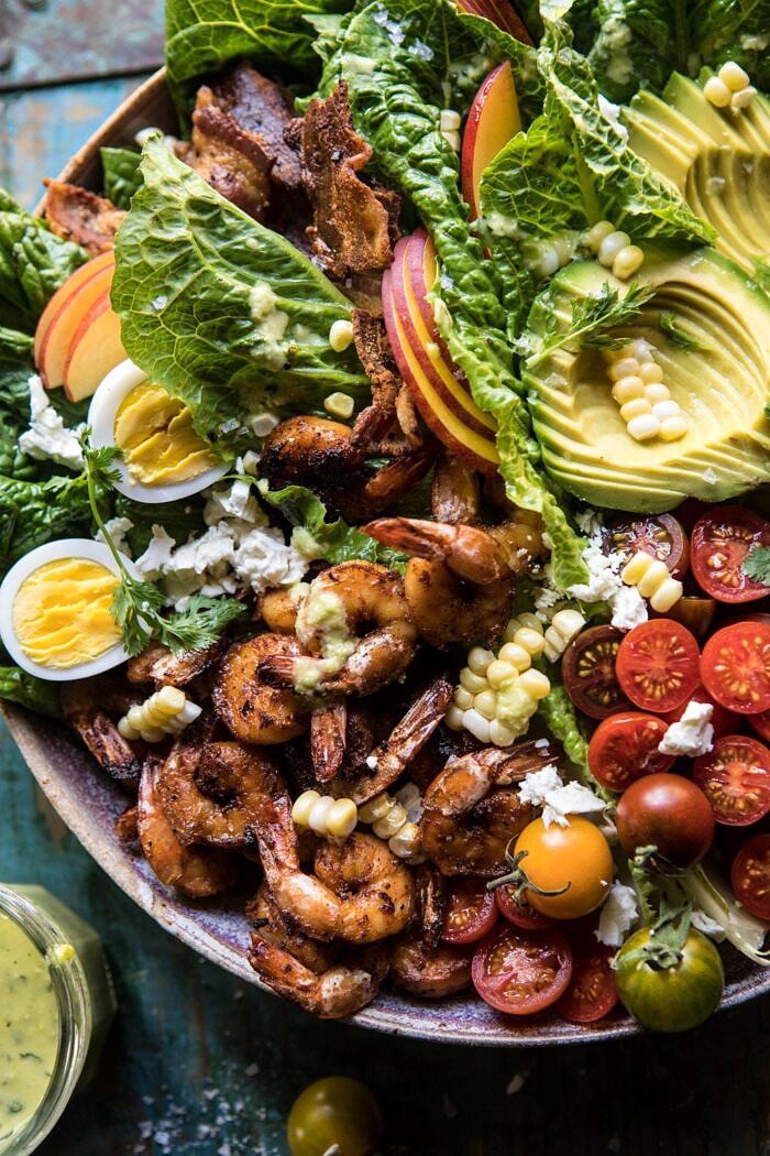 Chipotle Shrimp Cobb Salad with Jalapeno Corn Vinaigrette | halfbakedharvest.com #shrimp #salad #summerrecipes #mexican close up overhead photo Chipotle Shrimp Cobb Salad with Jalapeno Corn Vinaigrette