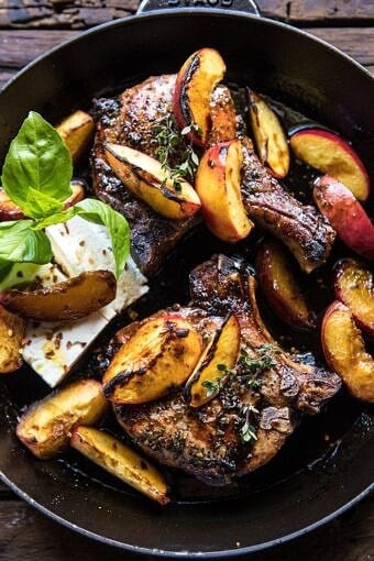 Skillet Balsamic Peach Pork Chops with Feta and Basil | halfbakedharvest.com #peaches #porkchops #easydinner #skilletrecipe