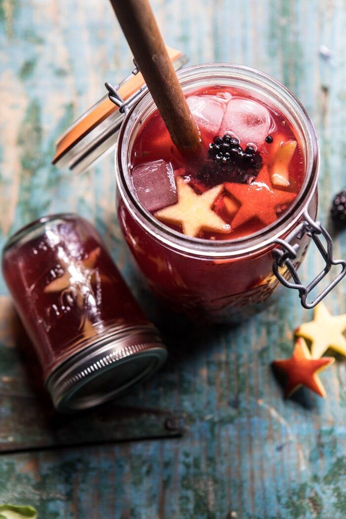 Smashed Berry Rose Spritz | halfbakedharvest.com #cocktails #4thofjulyrecipe #summerrecipes #easy
