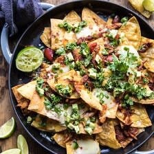 Chipotle Braised Chicken Nachos | halfbakedharvest.com #nachos #gamedayrecipe #football #fallrecipes #chickenrecipes