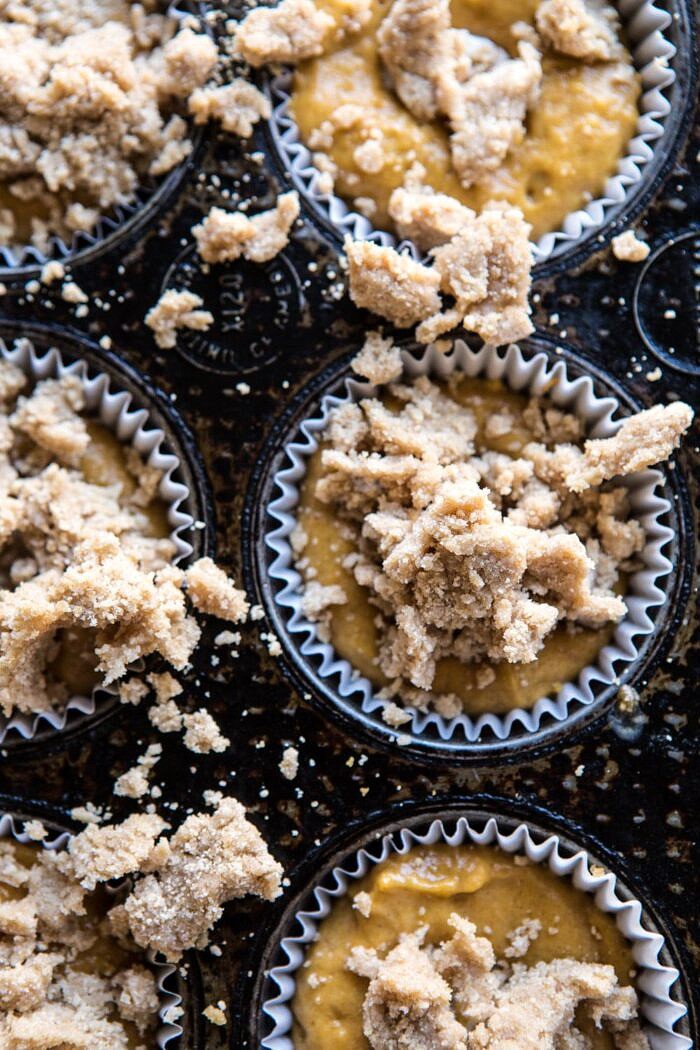 overhead photo of Pumpkin Coffee Cake Muffins before baking with streusel on top