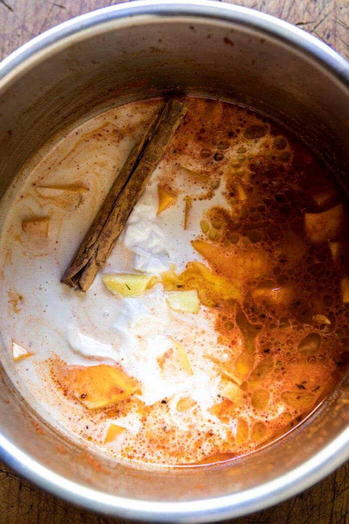 Slow Cooker Saucy Thai Butternut Squash Curry | halfbakedharvest.com #slowcooker #easy #healthy #vegan #fallrecipes overhead photo of Slow Cooker Saucy Thai Butternut Squash Curry in slow cooker bowl before cooking