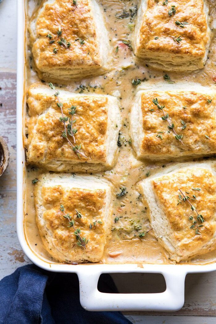 Homemade Broccoli Cheddar Cobbler | halfbakedharvest.com #broccoli #cheddar #soup #casserole #fallrecipes overhead close up photo of Homemade Broccoli Cheddar Cobbler