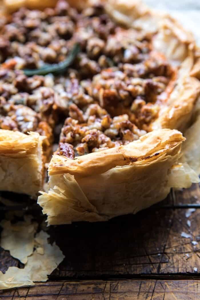 Bourbon Pecan Sweet Potato Phyllo Casserole | halfbakedharvest.com #sweetpotato #thanksgiving #holidayrecipes #fall #autumn close up side angle photo of Bourbon Pecan Sweet Potato Phyllo Casserole