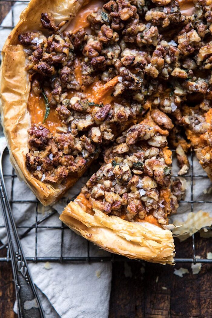 Bourbon Pecan Sweet Potato Phyllo Casserole | halfbakedharvest.com #sweetpotato #thanksgiving #holidayrecipes #fall #autumn overhead close up photo of Bourbon Pecan Sweet Potato Phyllo Casserole with piece cut