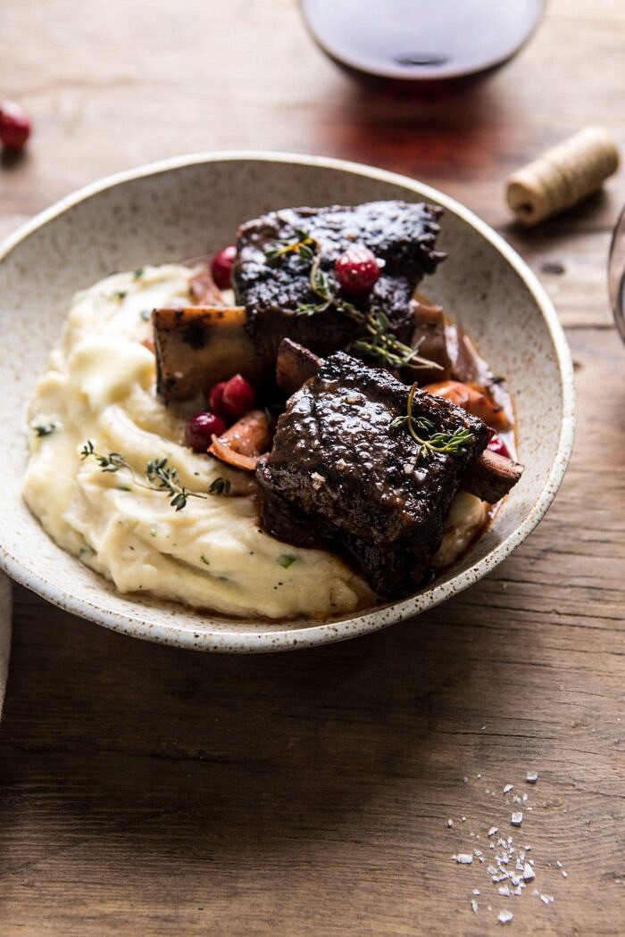 Red Wine Cranberry Braised Short Ribs | halfbakedharvest.com #slowcooker #easy #dinner #familyrecipes #holidayrecipes side angle photo of Red Wine Cranberry Braised Short Ribs