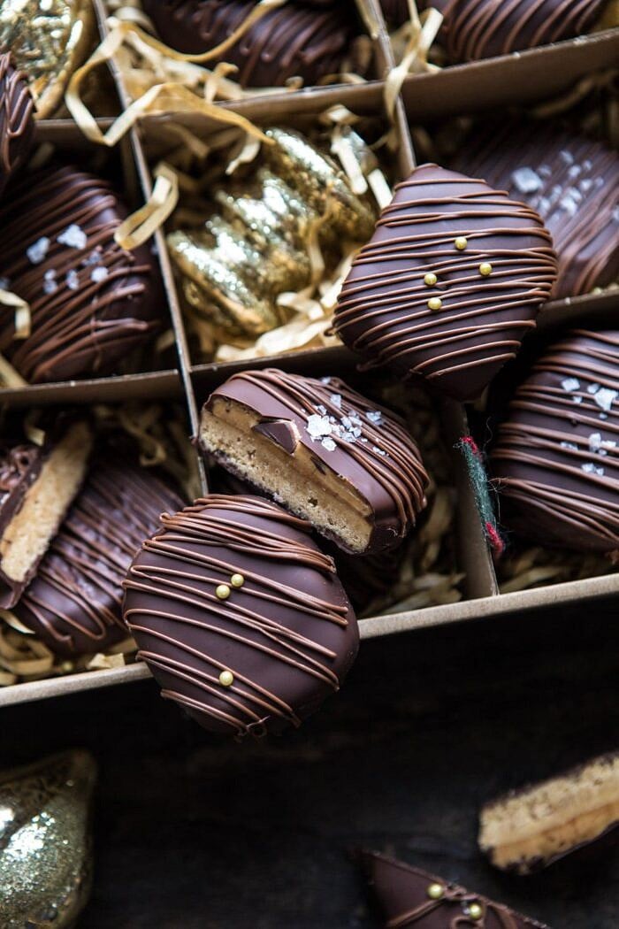 Slice n' Bake Chocolate Covered Peanut Butter Cookies | halfbakedharvest.com #cookies #Christmas #easyrecipes #chocolate #peanutbutter close up photo of Slice n' Bake Chocolate Covered Peanut Butter Cookies