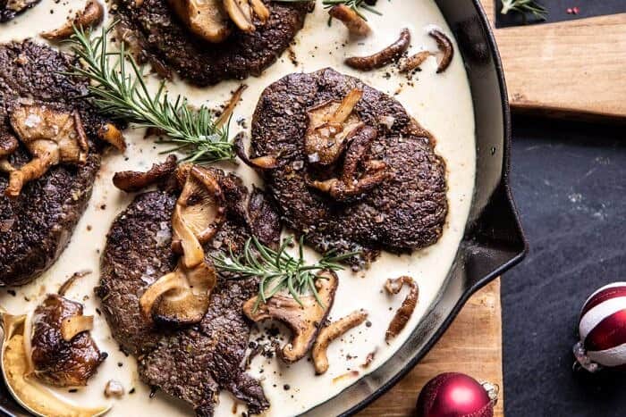 Rosemary Beef Tenderloin with Wild Mushroom Cream Sauce | halfbakedharvest.com #beef #tenderloin #christmas #easyrecipes