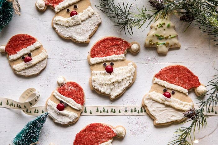 Chai Spiced Santa Cookies with White Chocolate Frosting | halfbakedharvest.com #sugarcookies #christmas #holiday #chai #dessert #easyrecipes horizontal photo of Chai Spiced Santa Cookies with White Chocolate Frosting