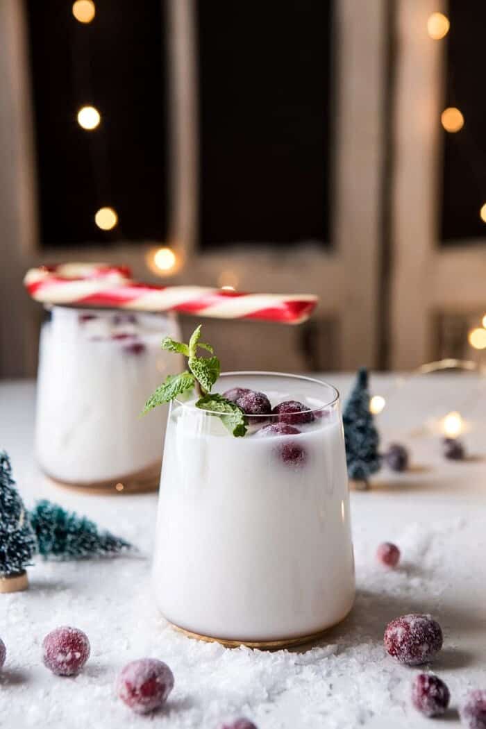 Christmas Snowstorm Margarita | halfbakedharvest.com #margarita #coconut #christmas #cocktailsaturday #christmascocktails side angle close up photo of Christmas Snowstorm Margarita