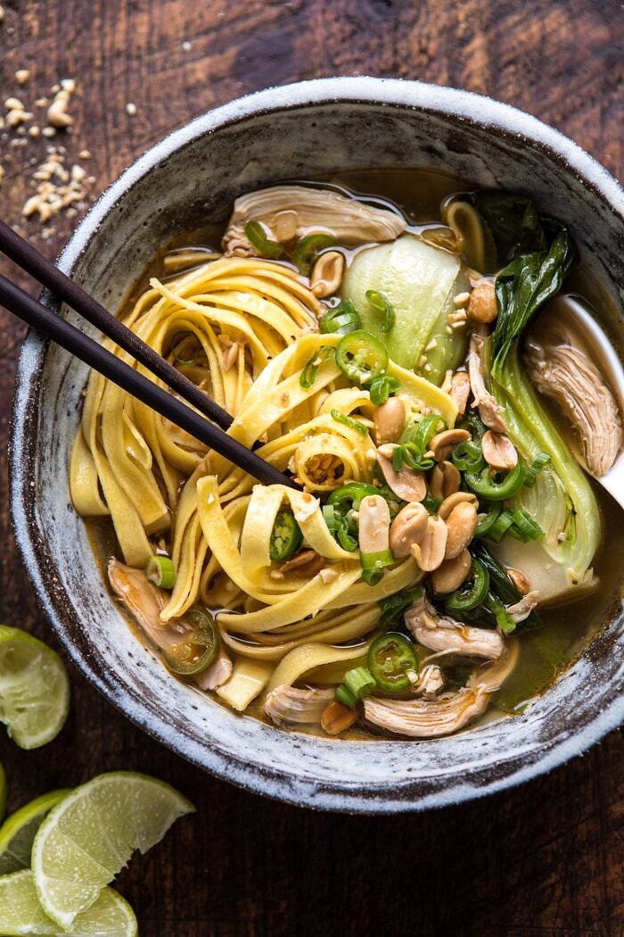 Ginger Peanut Chicken Noodle Soup | halfbakedharvest.com #soup #healthyrecipe #chickensoup #easyrecipes overhead close up photo of Ginger Peanut Chicken Noodle Soup