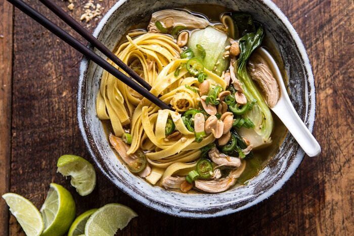 Ginger Peanut Chicken Noodle Soup | halfbakedharvest.com #soup #healthyrecipe #chickensoup #easyrecipes horizontal photo of Ginger Peanut Chicken Noodle Soup