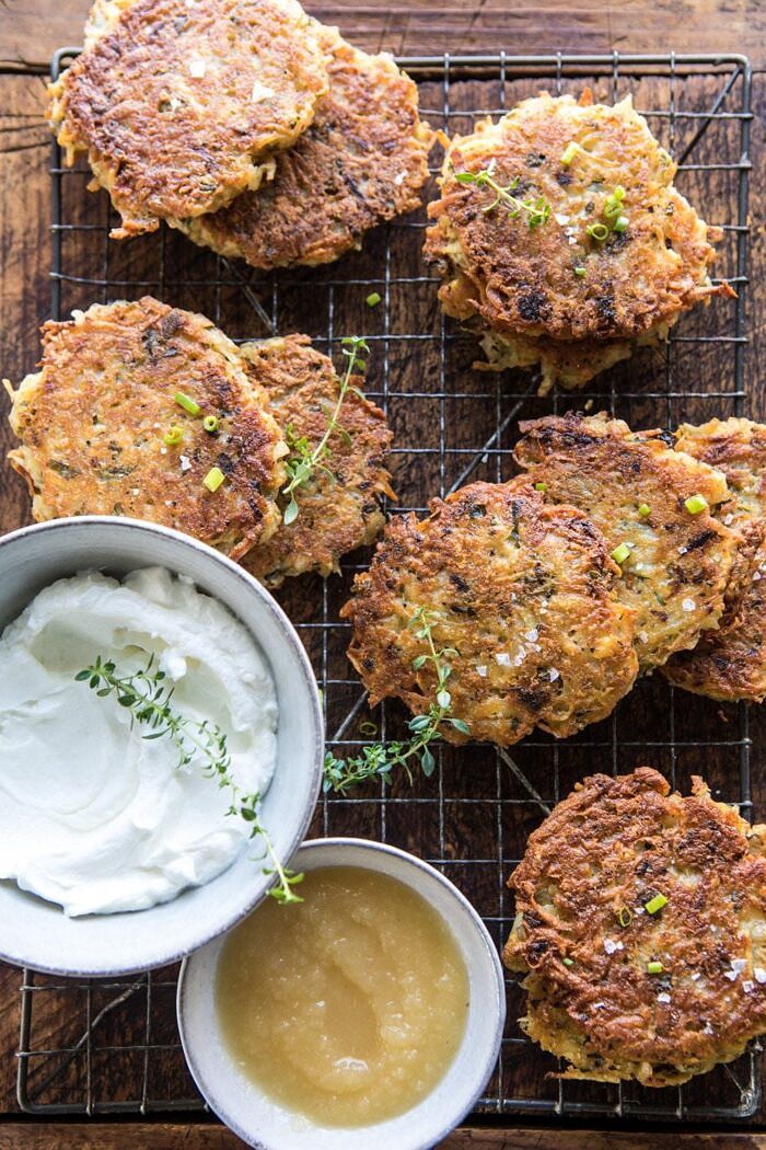 Herbed Cheddar Latkes | halfbakedharvest.com #potatoes #latkes #cheese #holiday #christmas #Hanukkah overhead photo of Herbed Cheddar Latkes