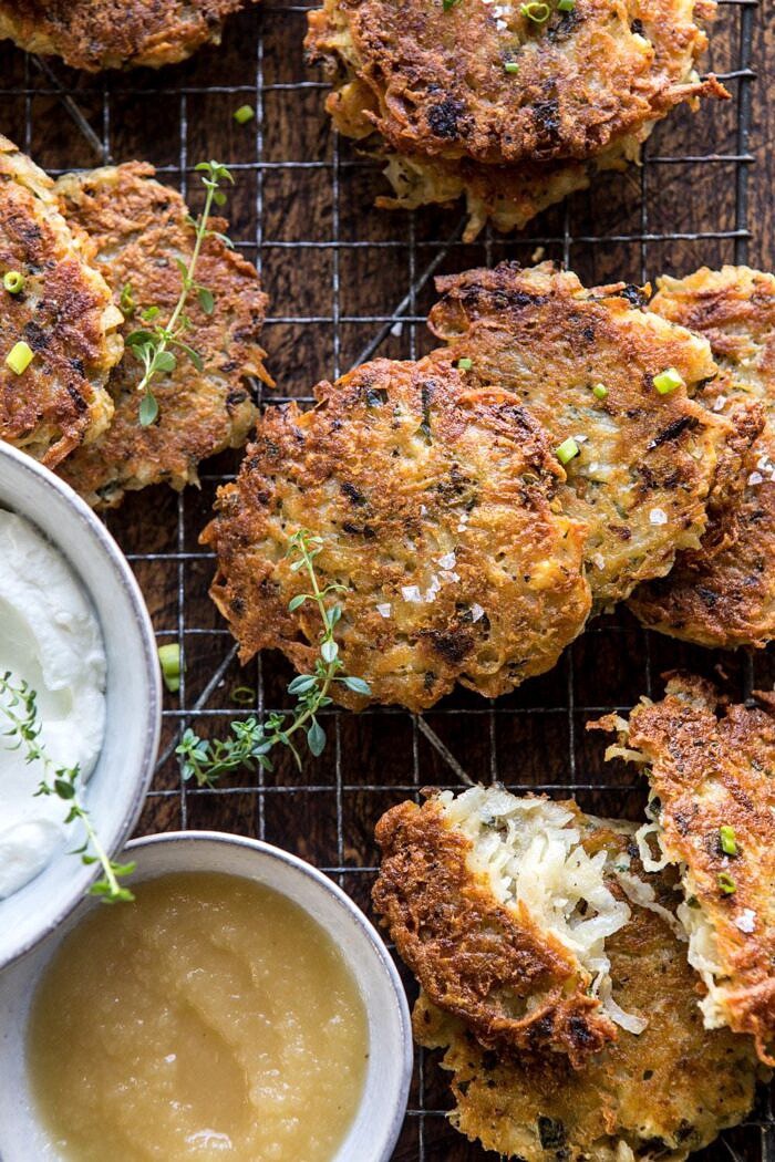 Herbed Cheddar Latkes | halfbakedharvest.com #potatoes #latkes #cheese #holiday #christmas #Hanukkah overhead close up photo of Herbed Cheddar Latkes