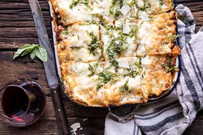 horizontal photo of Pesto Bolognese Lasagna 