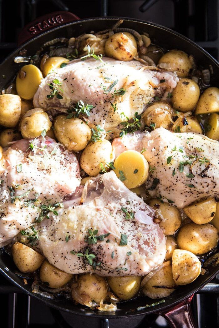 French Onion Chicken and Potatoes in skillet before roasting 