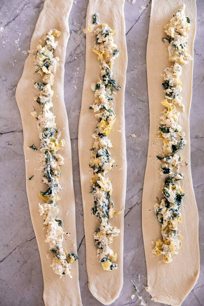 Spinach and Artichoke Stuffed Soft Pretzel dough before rolling into pretzels
