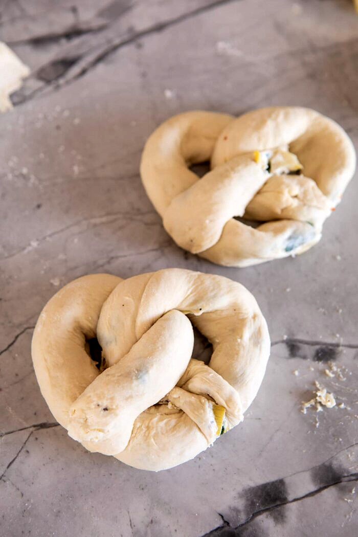 Spinach and Artichoke Stuffed Soft Pretzels before baking