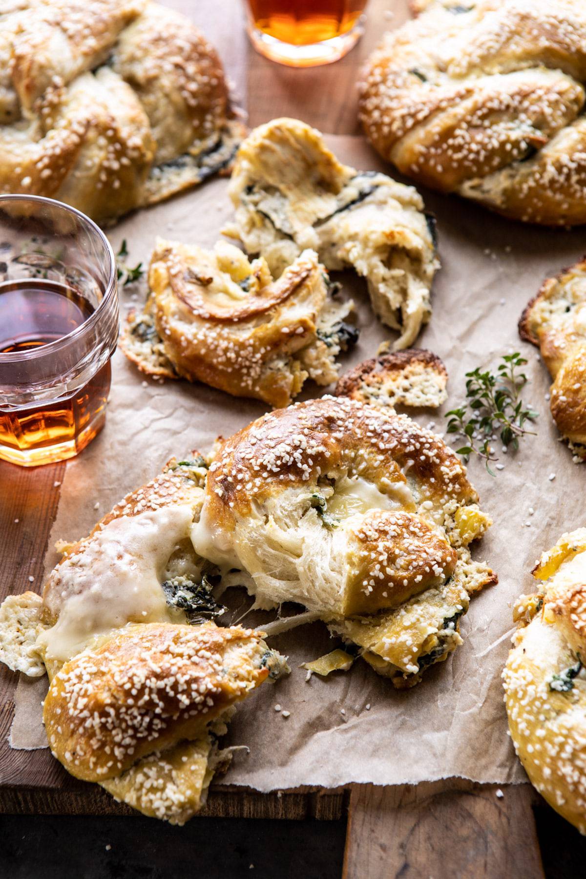 Spinach and Artichoke Stuffed Soft Pretzels | halfbakedharvest.com #softpretzels #appetizer #easyrecipes #pretzels #snacks