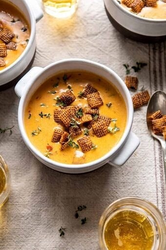 Beer Cheese Soup with Chili Spiced Chex | halfbakedharvest.com #soup #easyrecipes #cheesy #winter #cheese #gameday