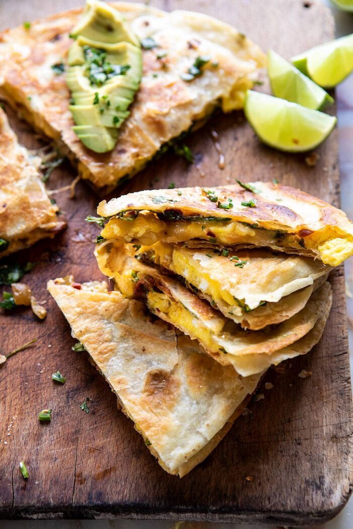 side angle photo of Breakfast Quesadilla with Soft Scrambled Eggs and Avocado Salsa 
