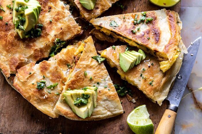 horizontal photo of Breakfast Quesadilla with Soft Scrambled Eggs and Avocado Salsa 