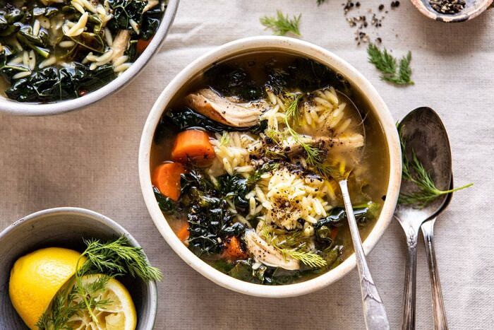 Lemony Garlic Chicken and Orzo Soup | halfbakedharvest.com #chickensoup #kale #healthyrecipes #winter horizontal photo of Lemony Garlic Chicken and Orzo Soup