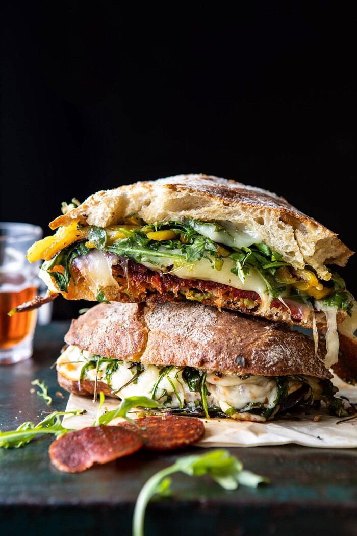 Party Size Italian Melt | halfbakedharvest.com #grilledcheese #easyrecipes #gameday side angled photo of Party Size Italian Melt stacked on top of each other