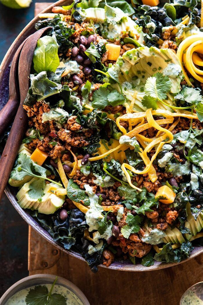 Spicy Turkey Taco Salad with Baja Dressing | halfbakedharvest.com #tacos #salad #avocado #healthyrecipes #mexican #easyrecipes close up photo of Spicy Turkey Taco Salad with Baja Dressing