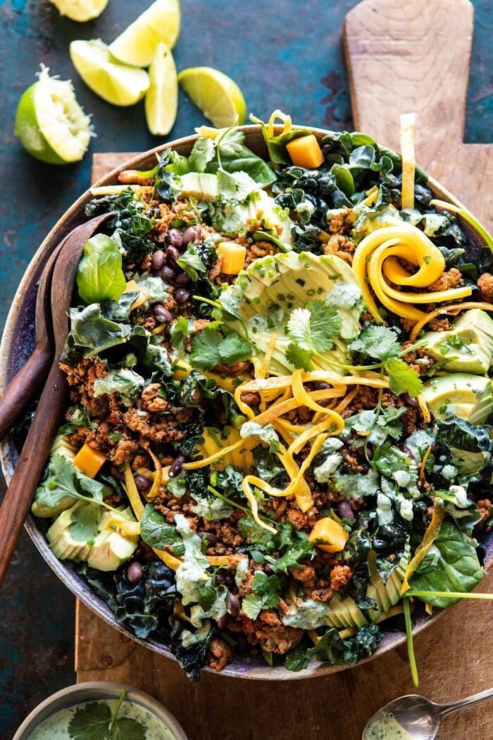 Spicy Turkey Taco Salad with Baja Dressing | halfbakedharvest.com #tacos #salad #avocado #healthyrecipes #mexican #easyrecipes overhead close up photo of Spicy Turkey Taco Salad with Baja Dressing