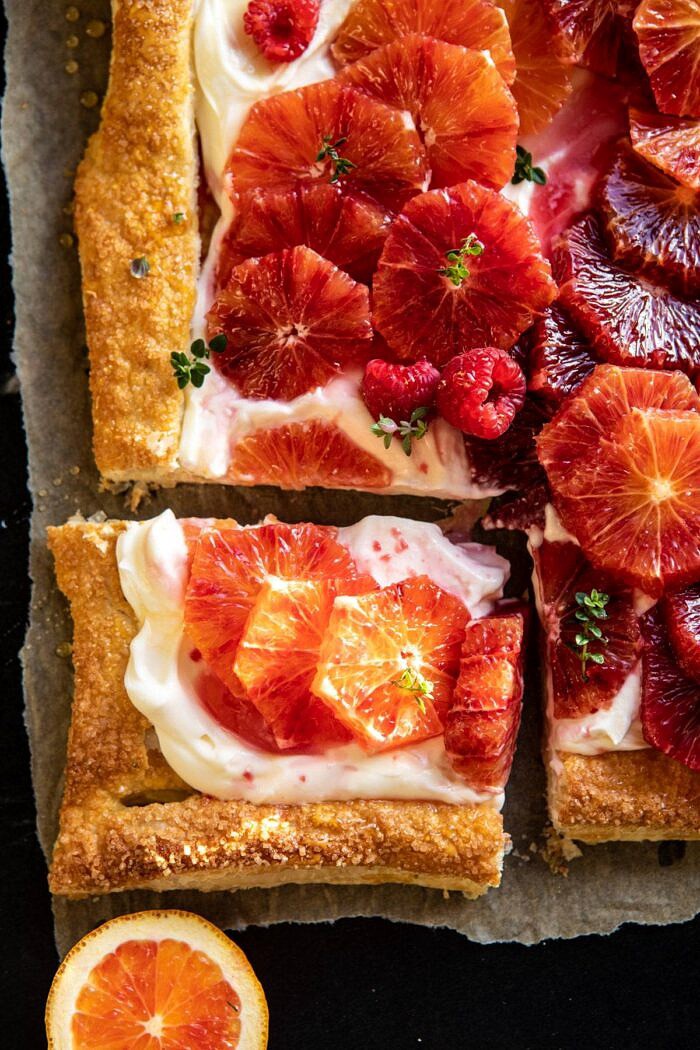 The Simplest Ombrè Citrus Cream Tart | halfbakedharvest.com #dessert #winter #citrus #healthyrecipes #easyrecipes overhead close up photo of The Simplest Ombrè Citrus Cream Tart