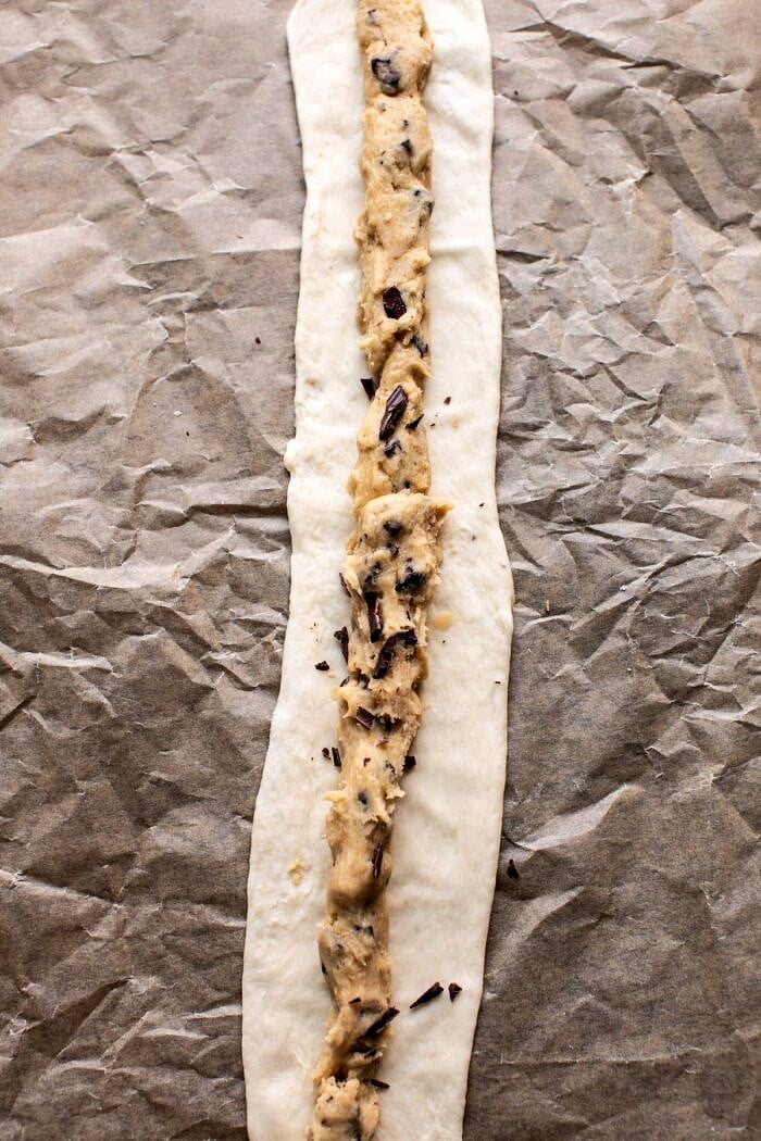 Chocolate Chip Cookie dough on soft pretzel before baking
