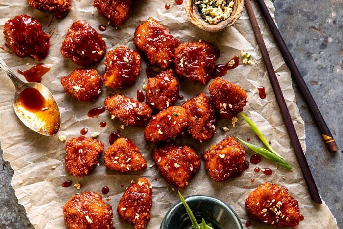 Oven Fried Korean Popcorn Chicken | halfbakedharvest.com #chicken #koreanrecipes #easyrecipes #dinnerrecipes horizontal photo of Oven Fried Korean Popcorn Chicken