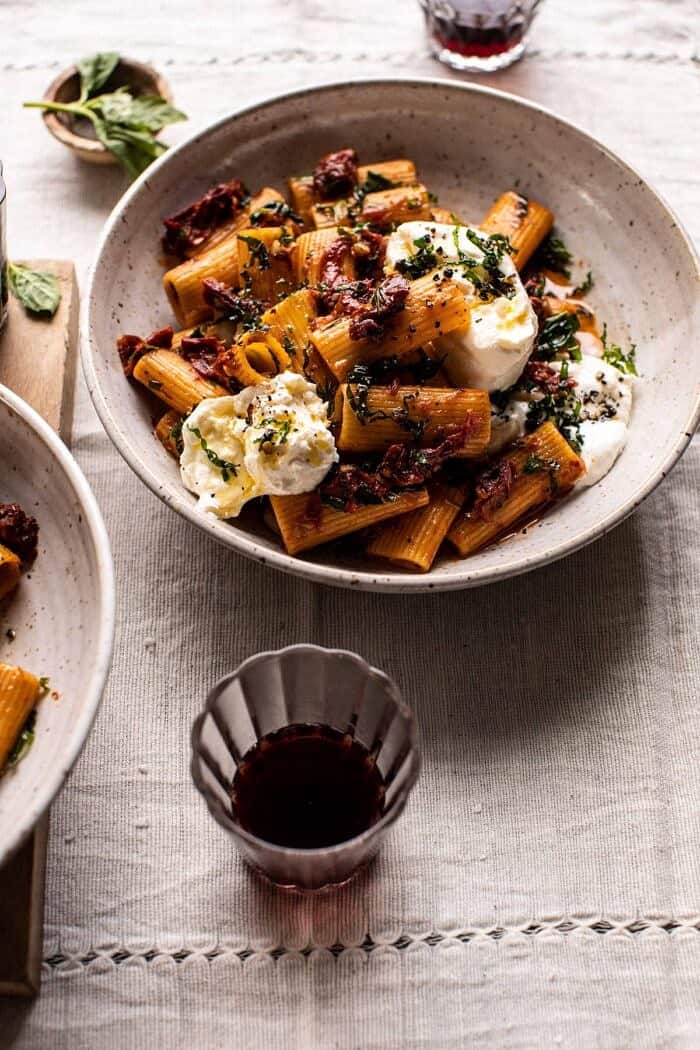side angled photo of Quick Pantry Pasta with Sun-Dried Tomatoes and Burrata 