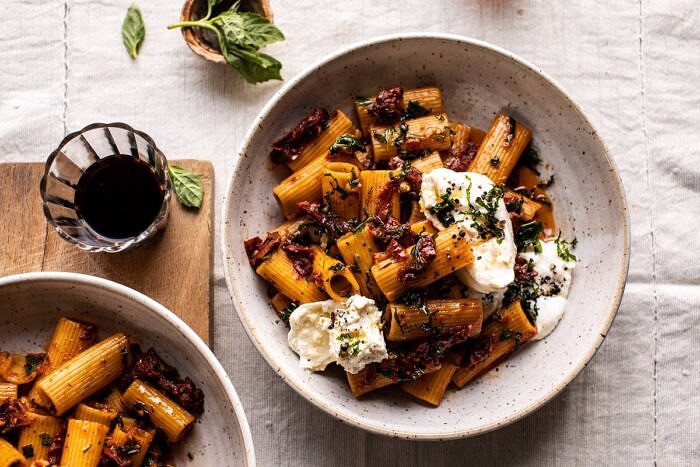 horizontal photo of Quick Pantry Pasta with Sun-Dried Tomatoes and Burrata