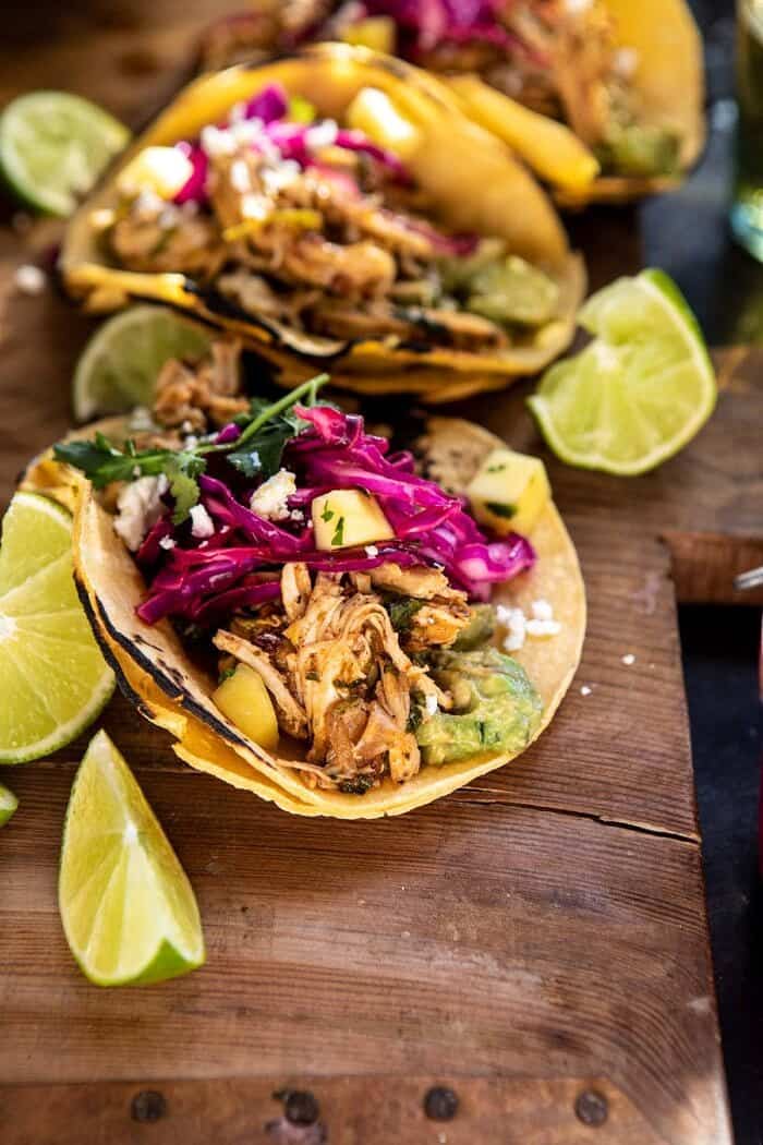 Slow Cooker Chipotle Orange Street Tacos | halfbakedharvest.com #tacos #instantpot #crockpot #easyrecipes #healthy side angle photo of Slow Cooker Chipotle Orange Street Tacos