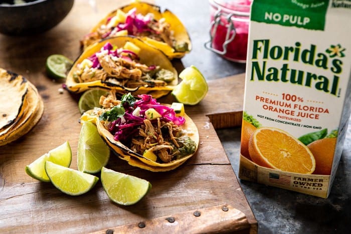 Slow Cooker Chipotle Orange Street Tacos | halfbakedharvest.com #tacos #instantpot #crockpot #easyrecipes #healthy side angle front on photo of Slow Cooker Chipotle Orange Street Tacos