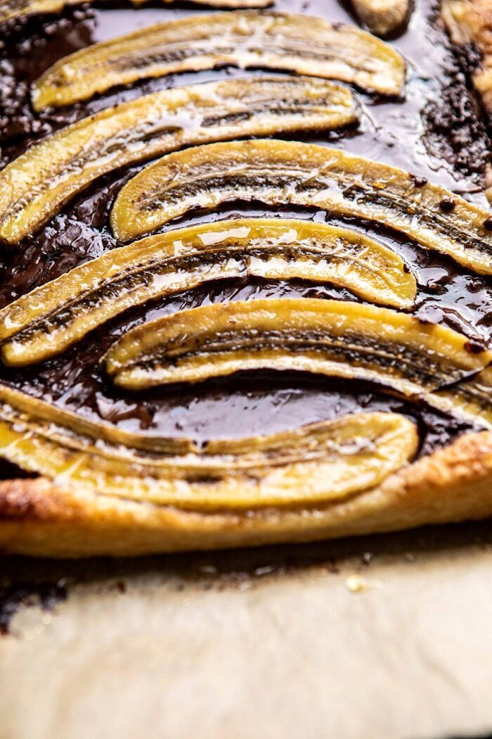 Warm Chocolate Banana Galette | halfbakedharvest.com #banana #chocolate #dessert #easyrecipes #chocolaterecipes #baking side angled photo of Warm Chocolate Banana Galette
