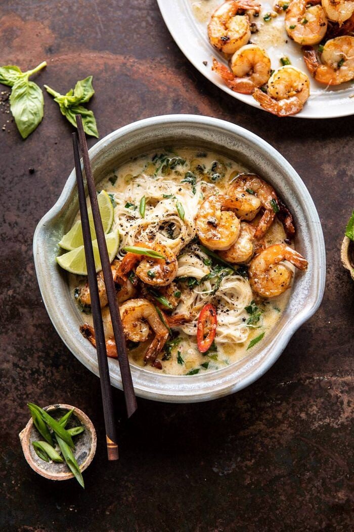 Saucy Garlic Butter Shrimp with Coconut Milk and Rice Noodles | halfbakedharvest.com #shrimp #easyrecipes #healthy #seafood #thairecipes #asian overhead photo of Saucy Garlic Butter Shrimp with Coconut Milk and Rice Noodles