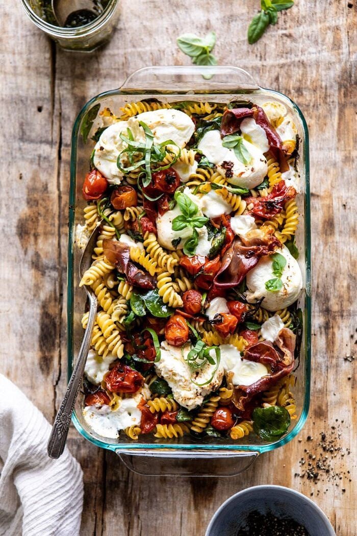 Caprese Pesto Pasta Bake | halfbakedharvest.com #caprese #pesto #pasta #easyrecipes overhead photo of Caprese Pesto Pasta Bake