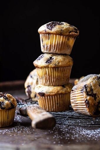 Cheesecake Stuffed Chocolate Chunk Banana Bread Muffins | halfbakedharvest.com #muffins #cheesecake #bananamuffin #dessert