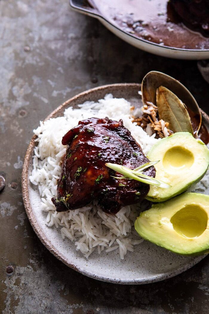 Filipino Coconut Adobo Chicken | halfbakedharvest.com #chicken #easyrecipes #skilletrecipes #adobochicken Filipino Coconut Adobo Chicken on plate with rice