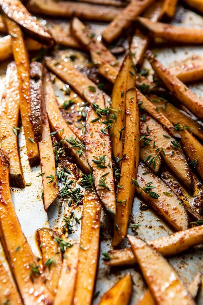Roasted Chicken Gyros with Tzatziki and Feta Fries | halfbakedharvest.com #greek #gyro #easyrecipes #healthy #chicken fries on baking sheet