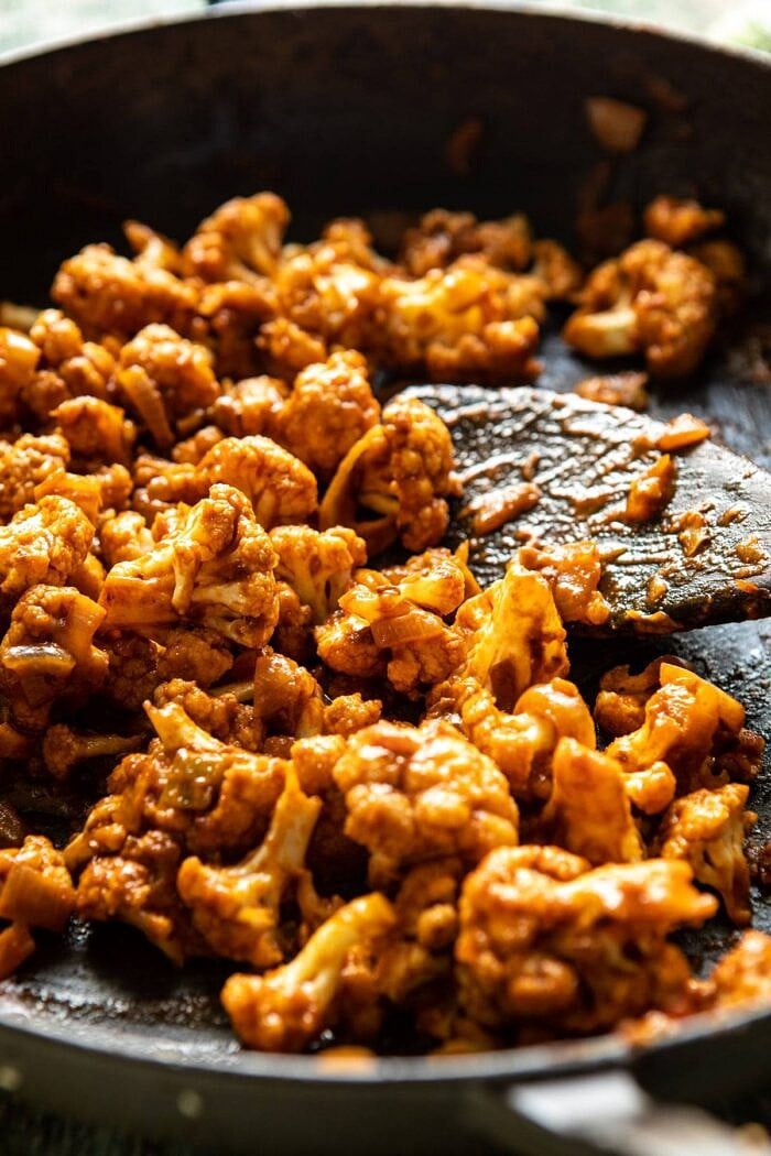 side angled photo Cauliflower Al Pastor in skillet 