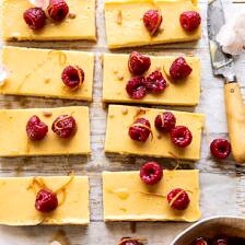 Creamy Lemon Bars with Browned Butter Raspberries | halfbakedharvest.com #lemon #brownbutter #spring #summer #easter #mothersday #brunch #dessert
