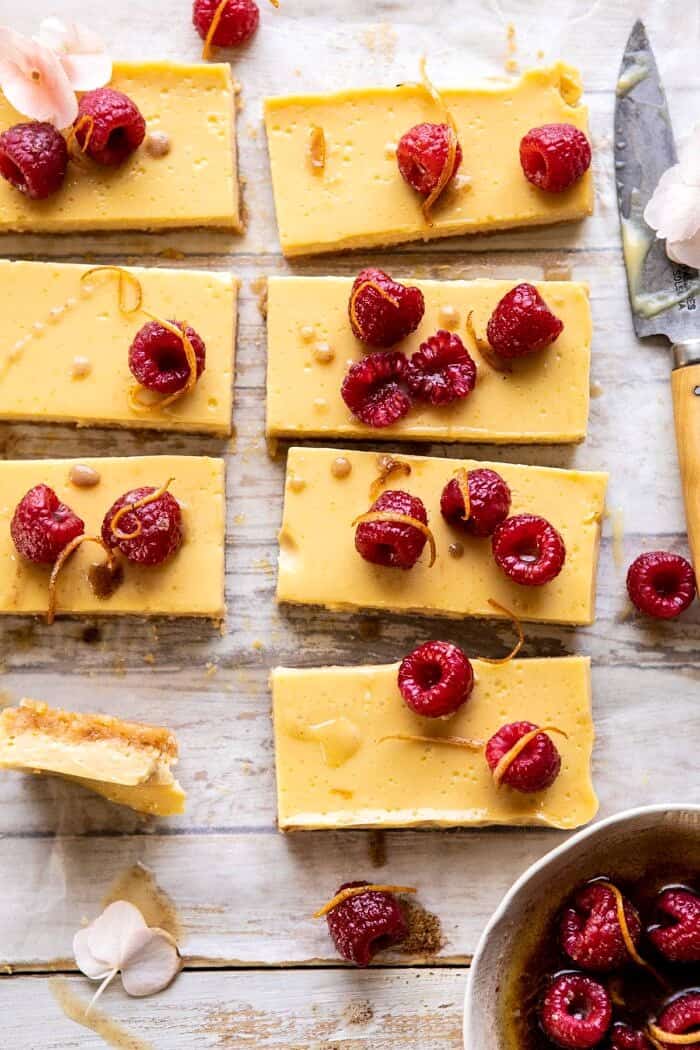 close up photo of Creamy Lemon Bars with Browned Butter Raspberries 