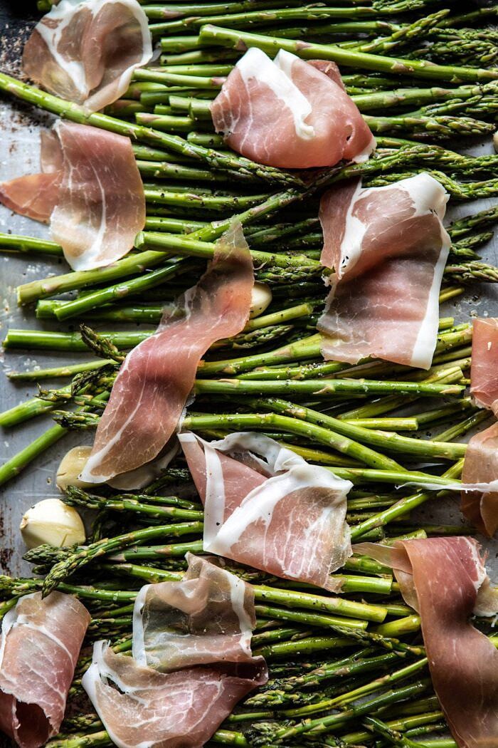 Prosciutto and Asparagus on baking sheet before roasting